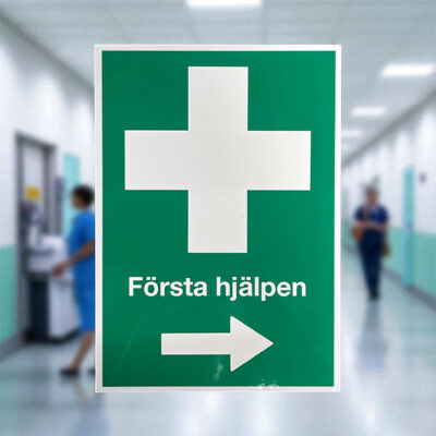 Nödskylt Första hjälpen pil höger